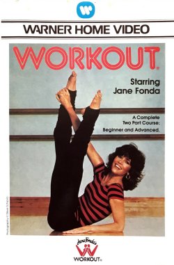 VHS cover of Jane Fonda in legwarmers with her feet in the air, beaming.